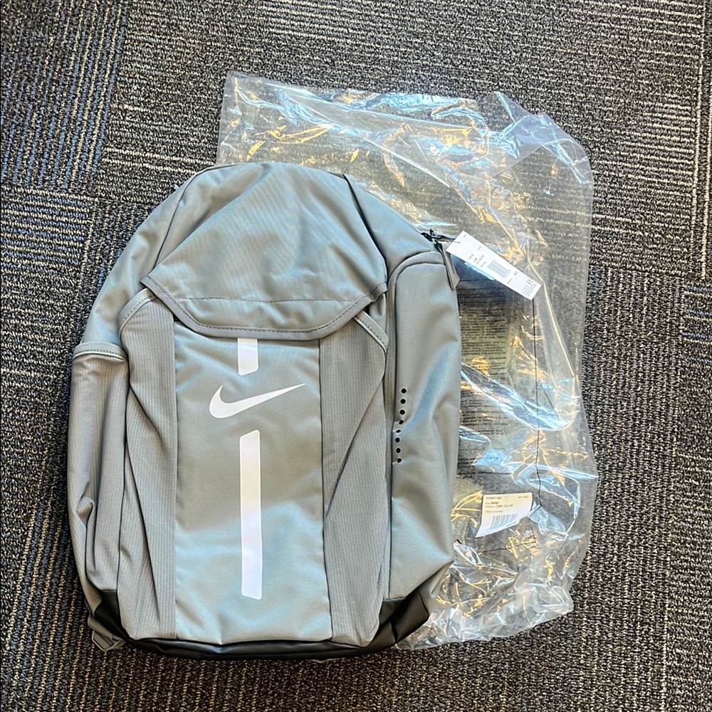 Nike Light Gray Men’s Backpack with White Swoosh